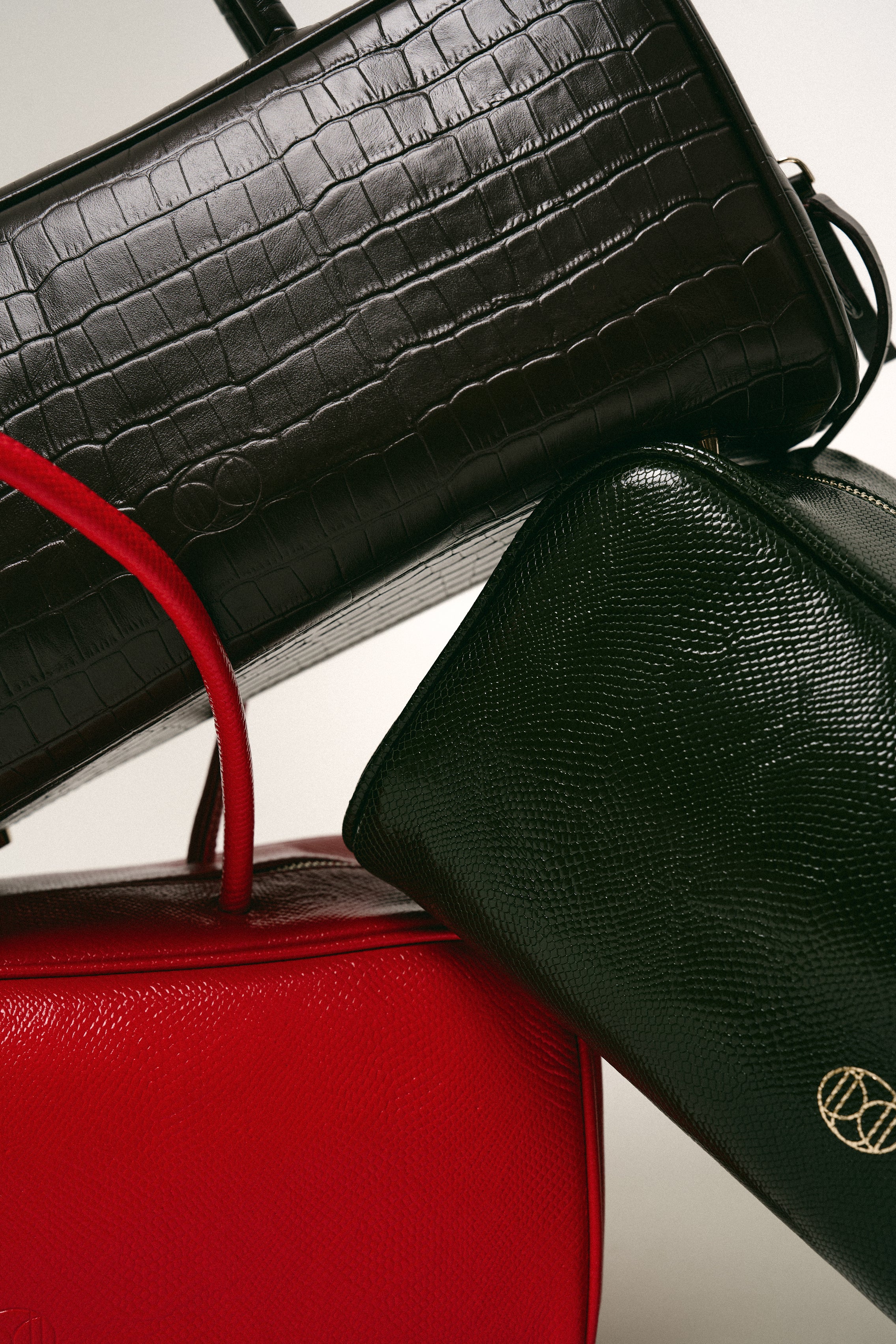 Du'MO Texture Drop — suede and grained leather bags
